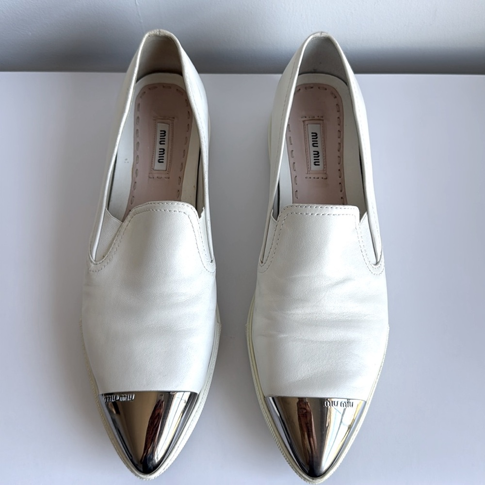 Miu Miu White Leather Slip-On Sneakers with Silver Toe Cap